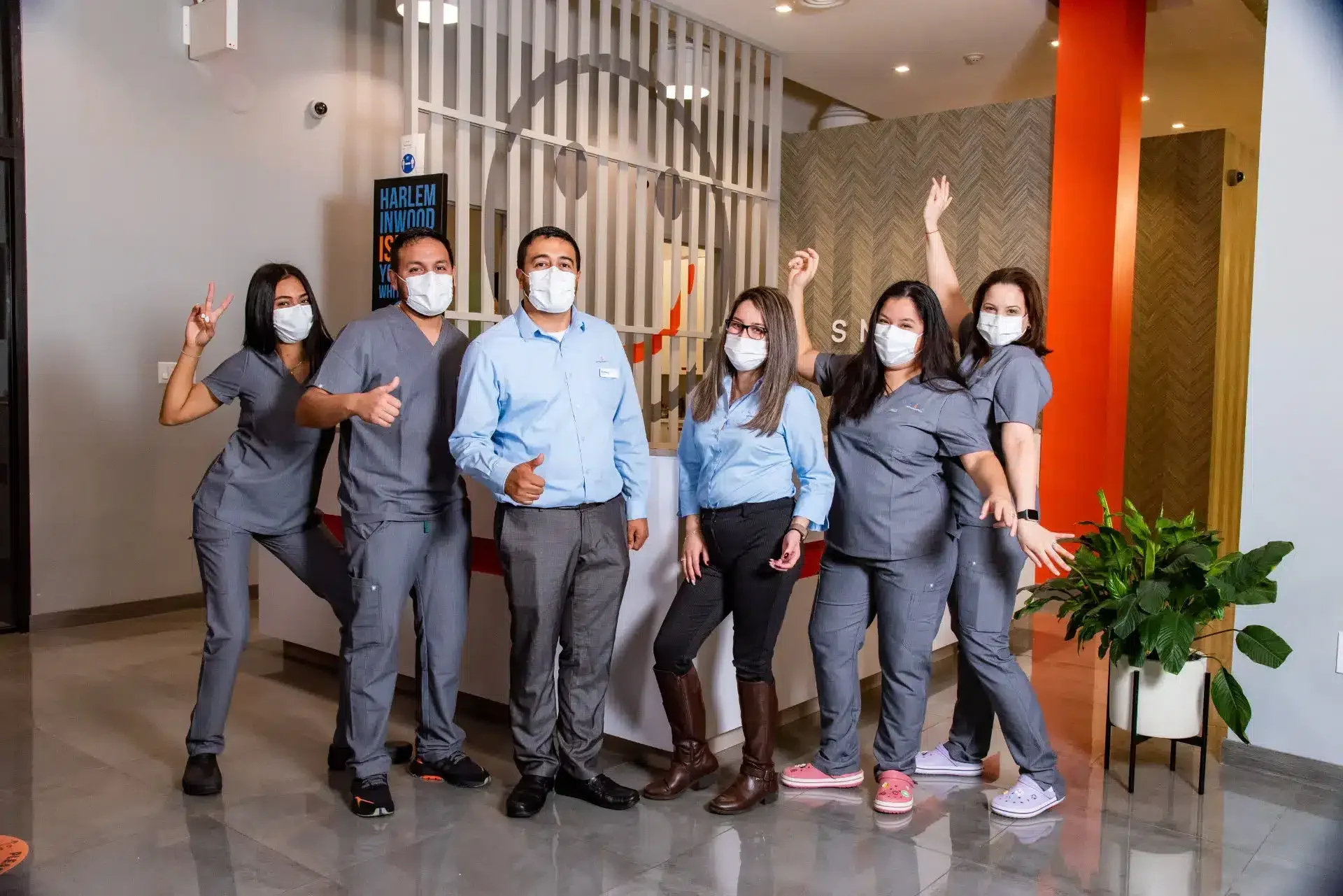 The orthodontic team posing